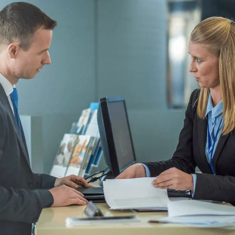 Investigators reviewing a workplace or claims file