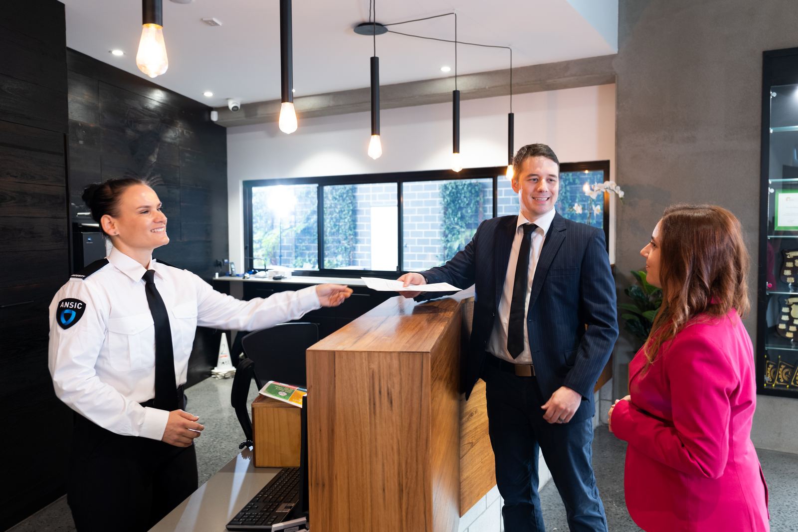 ANSIC officer at a reception desk